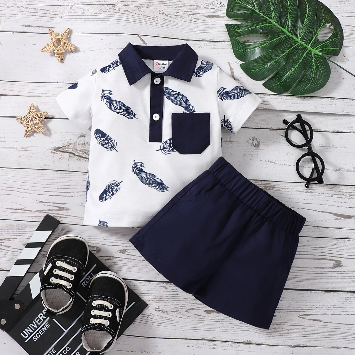 

PatPat 2pcs Baby Boy 100% Cotton Solid Shorts and Allover Feather Print Contrast Collar Short-sleeve Polo Shirt Set