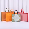 StoBag 25pcs Wholesale Non-woven Shopping Bags Tote Fabric Clothes Packing Portable Waterproof Storage Reusable Large Pouch Home 2