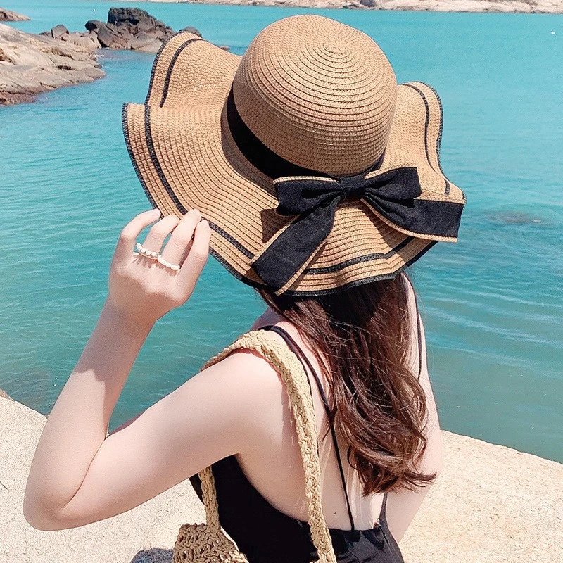 Spring And Summer Woven Straw Hat Women's Versatile Beach Big Edge Bow Sun Shield Hat Noble Style Sun Shield