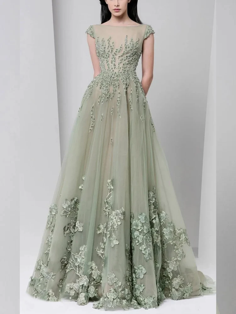 فساتين سهرة ربيعية 2025 شفافة برقبة قارب مزينة بال...