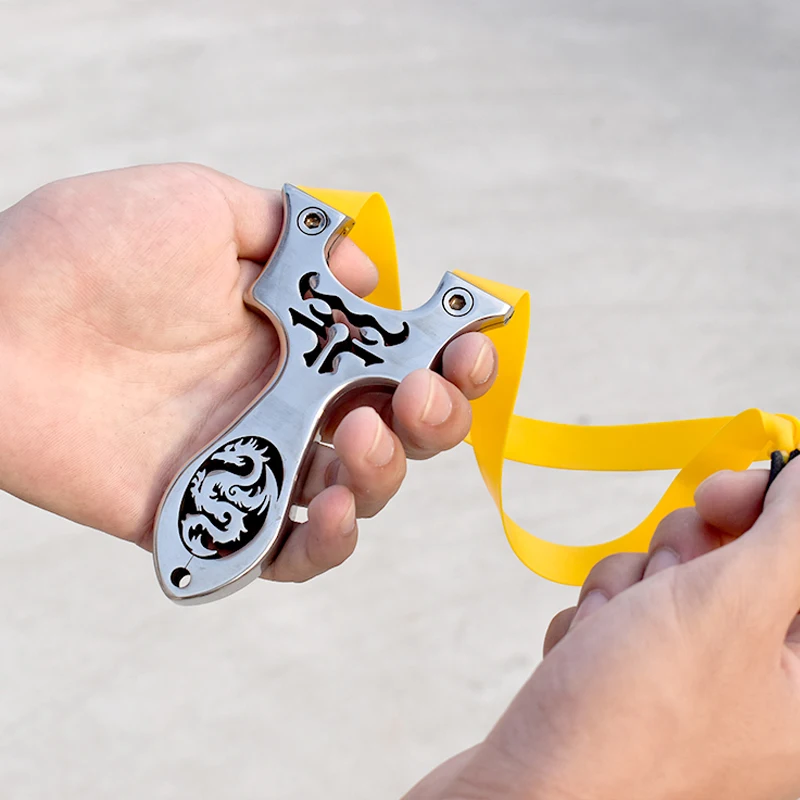 

One-piece Stainless Steel Slingshot High-strength Professional Hunting Shooting Slingshot Hollow Pattern with Rubber Band
