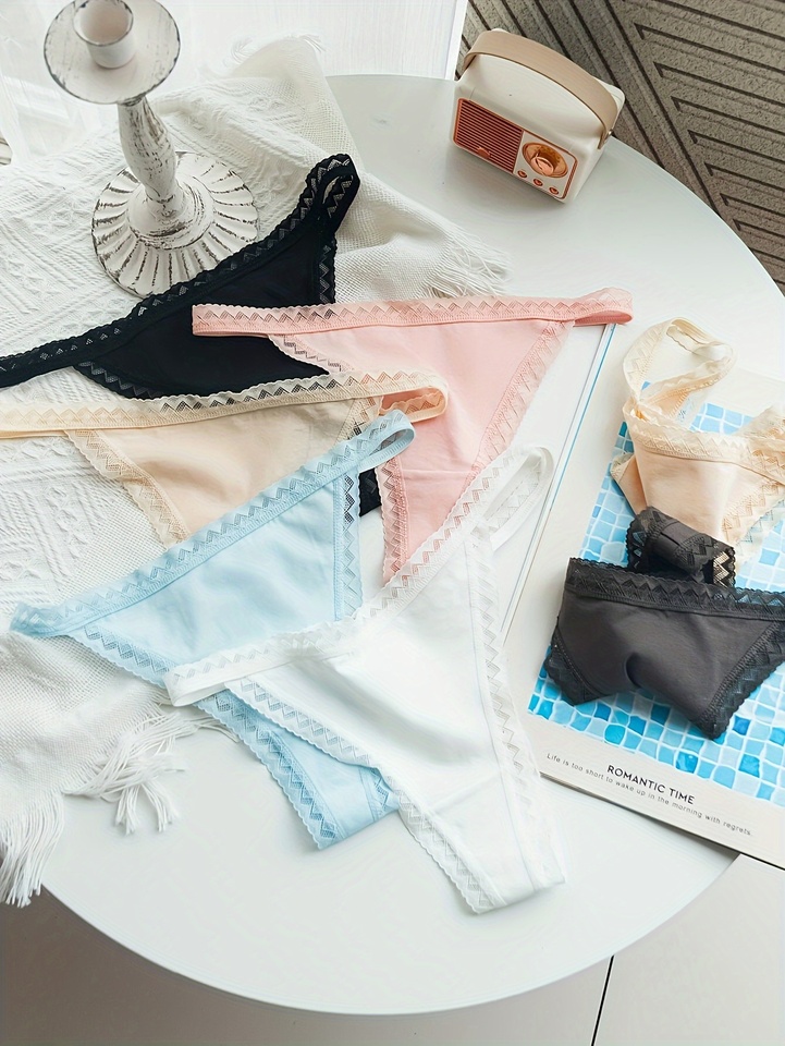 7 pairs of lace-trimmed, lace-up, women's thong with cutout and a simple new style of women's underwear