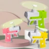 Fun decompression small fan carrot gun, mini creative manual portable handheld fan toy, decompression toy gun 1