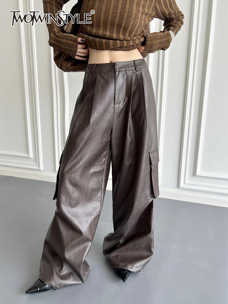 

TWOTWINSTYLE Solid Loose Cargo Leather Trouser For Women High Waist Patchwork Pocket Casual Wide Leg Pants Female Fashion New