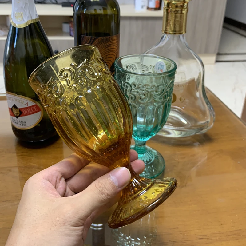 https://ae01.alicdn.com/kf/S3896ebd02bfc4467b556bdcd6aeeb831K/Amber-Wine-Glasses-Juice-Goblet-Beverage-Water-Cup-Spirits-Champagne-Retro-Embossed-Wedding-Banquet-10oz-Home.jpg