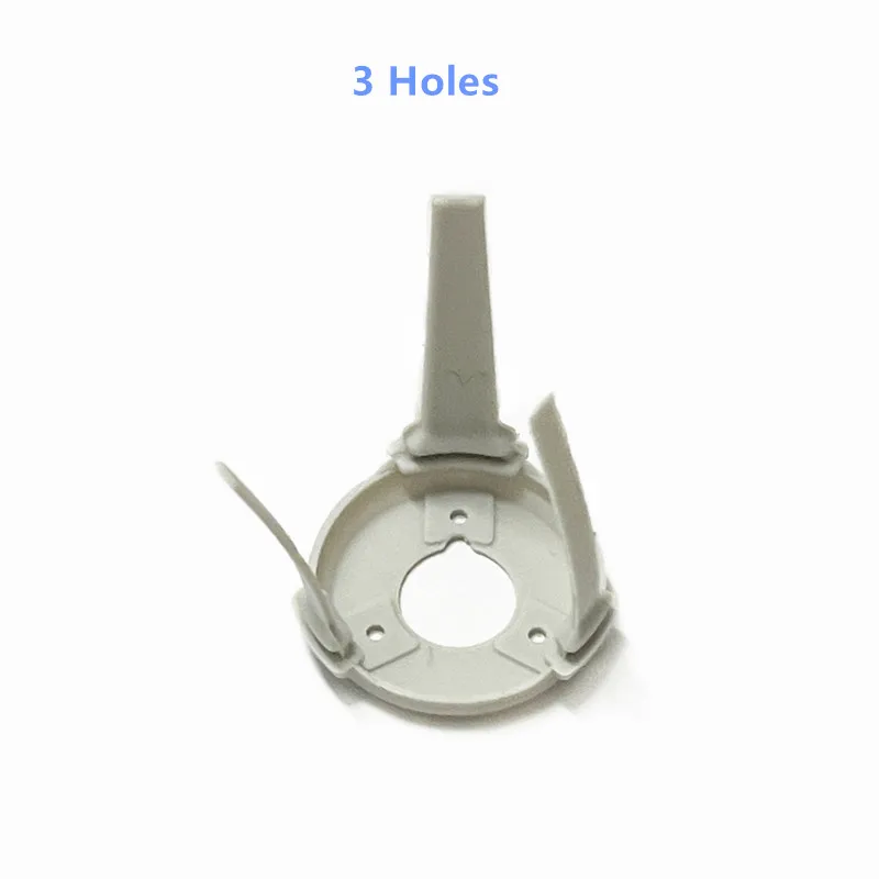 Lot de quatre caoutchoucs amortisseurs pour DJI Mini 4 Pro, disposés en croix sur une surface plane.