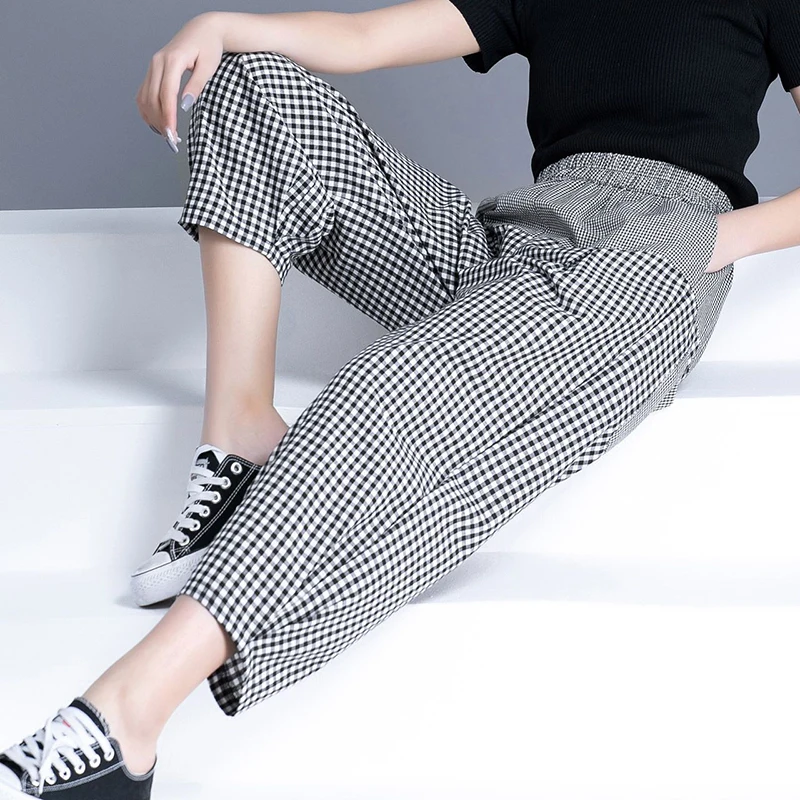 Рисунок 6 - Модные эластичные брюки-шаровары в клетку с карманами