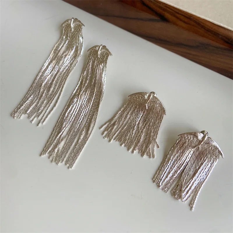 

fly bird fringed long earrings women's silver color exaggerated shining party chic stud earrings