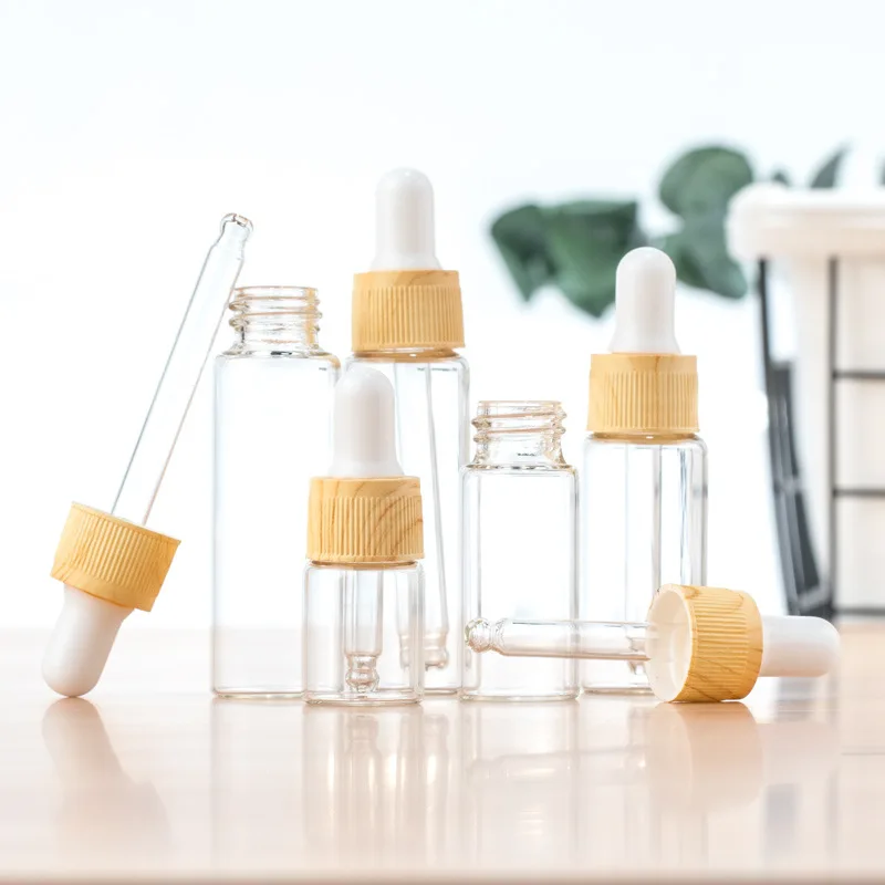 

Wooden Grain Glass Dropper Exquisite Travel Portable Dropper Dispenser Bottle Essential Oil Bottle Cosmetic Container Refillable