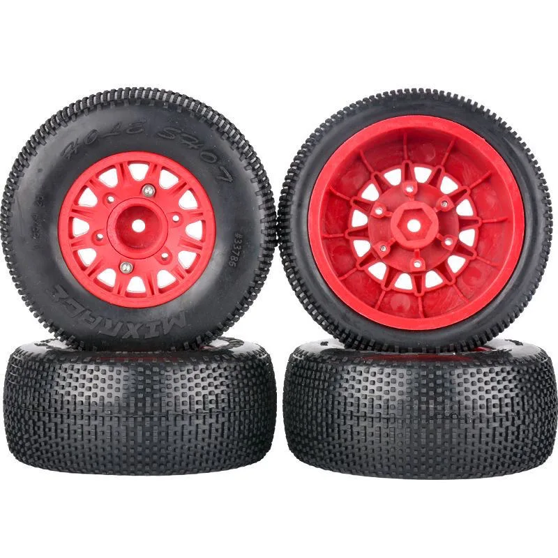 Ensemble des 4 roues RC 1/10 avec pneus crantés, idéales pour le tout-terrain.