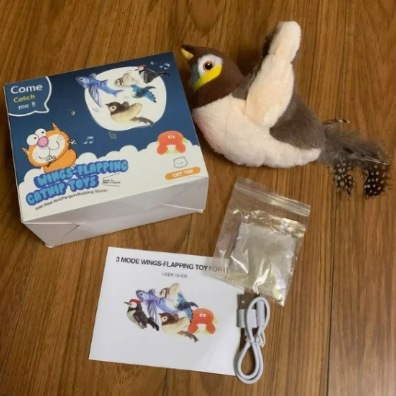 KittyNook Cat Co. Squeaky Plush Cat Toy set with USB cable and manual for engaging your cat on any wooden floor.
