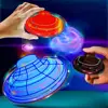 Mini Flying Ball Toys Magic Ball Flying Spinner Flight Gyro UFO Fingertip Drone Aircraft induction gyroscope Decompression Toy 1