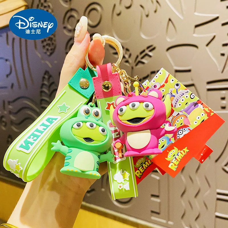 

Disney Alien Keychain Cute Cartoon Anime Toy Story Creative Cross-dressing Series Car Doll Pendant Couple Small Gift Bag Charm