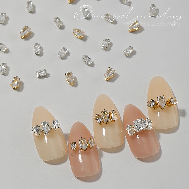 

HNUIX 50Pcs Quality Flatback Diamonds Sparkle Mini zircon Gold/Silver Nails Art Decoration Horse Eyes Water Drop Deisgner Charms