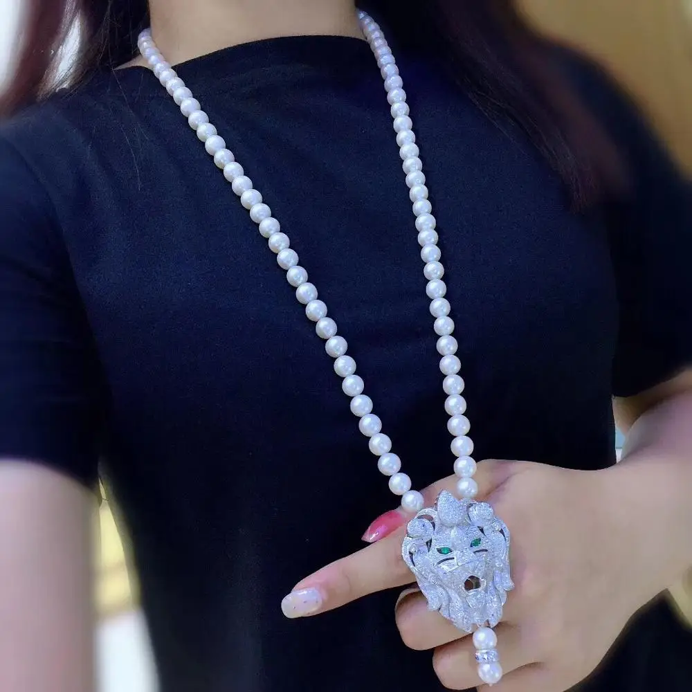 

Hot sell new 8-9mm natural white freshwater pearl necklace zircon accessories lion head pendant 75cm long fashion jewelry