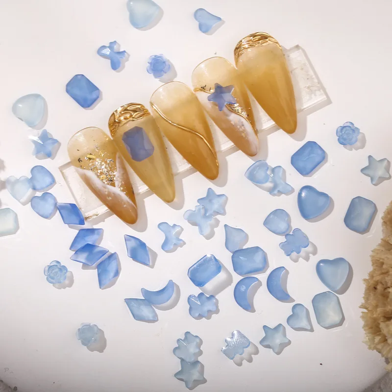 

100pcs Summer the new nail color blue light peach heart become love moon camellia butterfly pervious to light ornaments