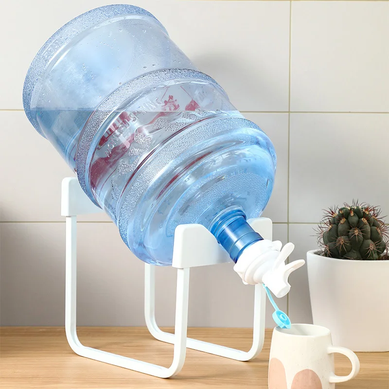 https://ae01.alicdn.com/kf/S392111eccc594c49bb4c0ec5c89ea903E/Drinking-Fountain-Gallon-Water-Bottle-Jug-Dispenser-Stand-Holder-Nozzle-Tap-Bottled-Water-Stand-Camping-Storage.jpg