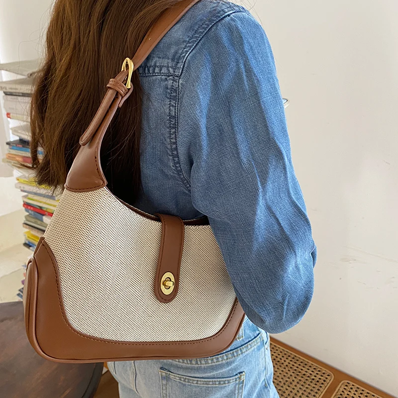 

2023 new canvas shoulder bag female retro crescent underarm senior sense niche ins patchwork color hand