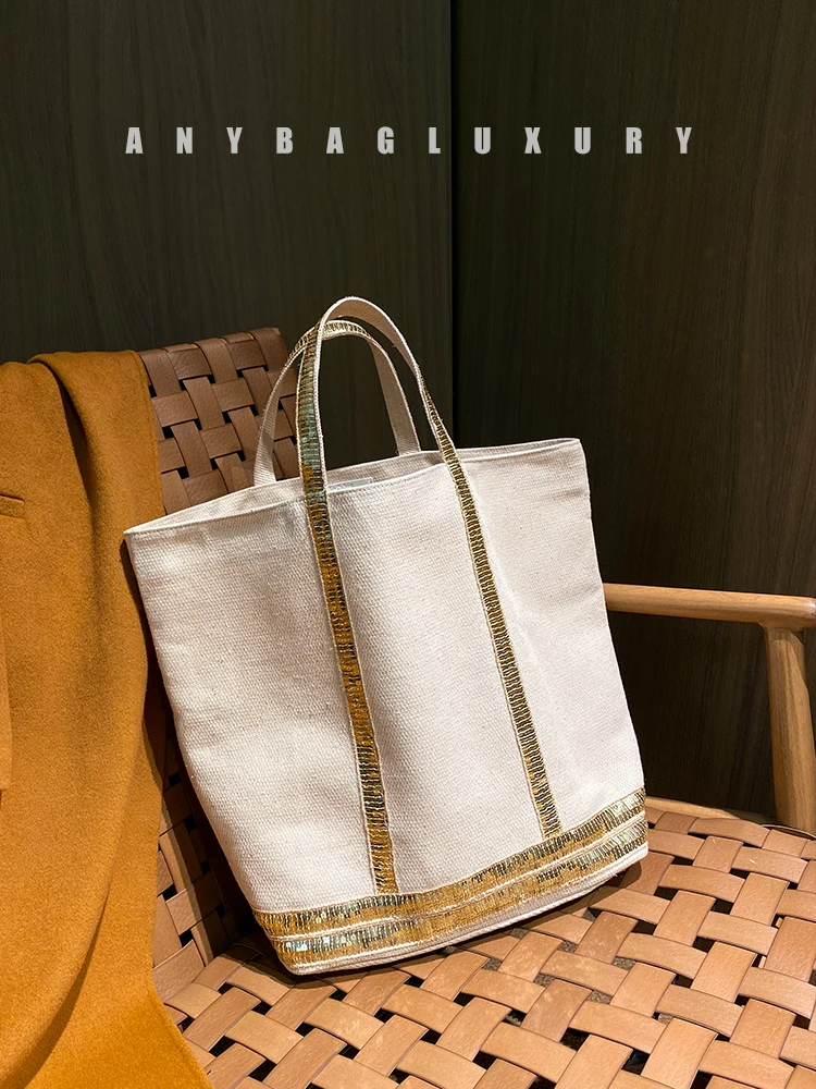 

Limited edition stylish and relaxed canvas with cowhide sequin studded tote bag
