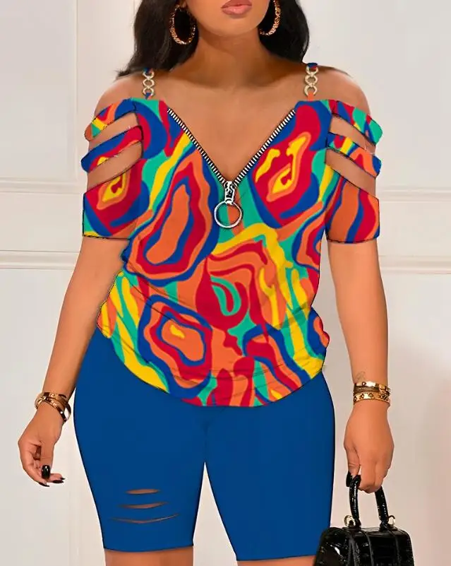 

Two Piece Sets Womens Outifits Summer Fashion Multi-Color Abstract Print Chain Decor Short Sleeve Top & Ladder Cutout Shorts Set