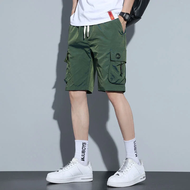 thumbnail image 1 of Pantalones cortos para hombre, talla grande, negros, de gran tamaño, sólidos, pantalones cortos cargo para hombre, nuevos en 2024, ropa de calle de moda, cómoda, elástica, Y2k, 1 of 5