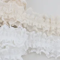⁦شريط دانتيل أبيض مطوي 1 ياردة – كشكش تطريز للملابس والإكسسوارات ✨🧵.⁩ - الصورة ⁦4⁩