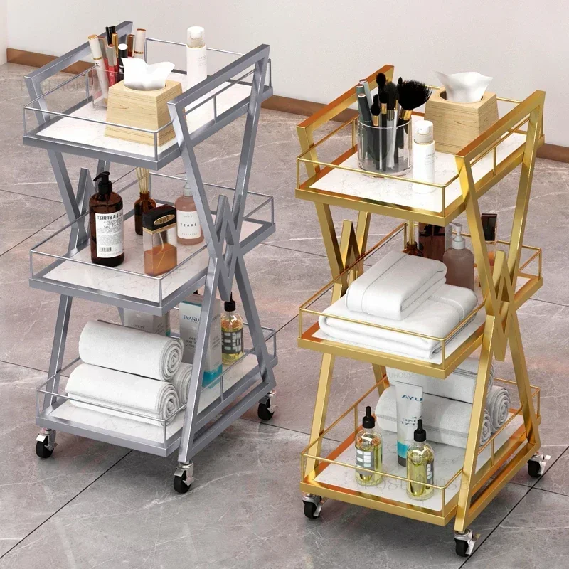 

Modern Iron Salon Trolleys Beauty Salon Tool Cart with Wheels Nordic Salon Furniture Professional Auxiliary Trolley Storage Rack