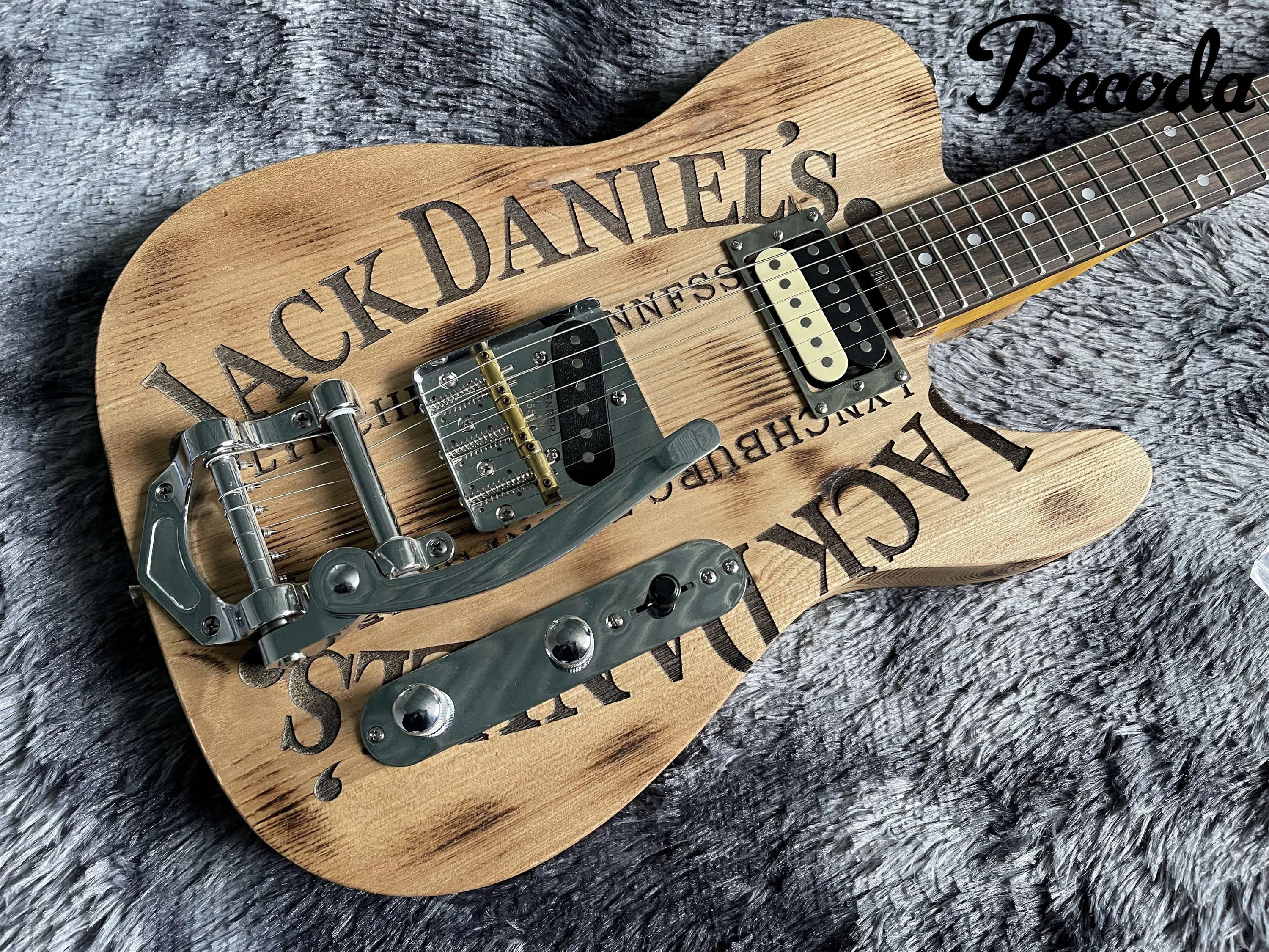 

China BecodaNew style electric guitar, handmade heavy relic guitar.Color can accept customization flamed maple wood neck