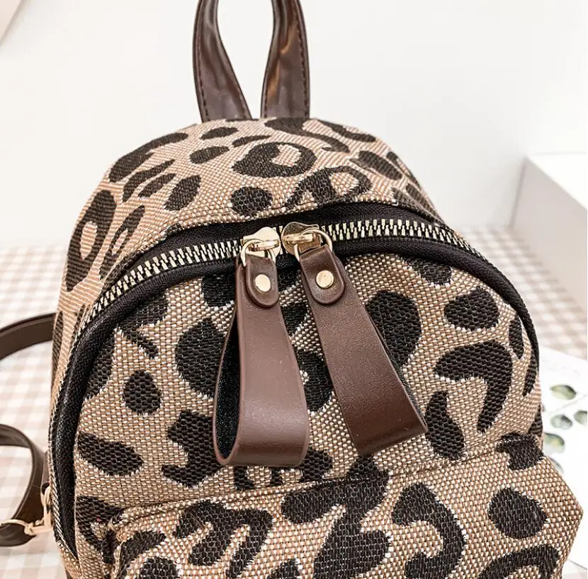 Mochila de viagem padrão leopardo para mulheres,