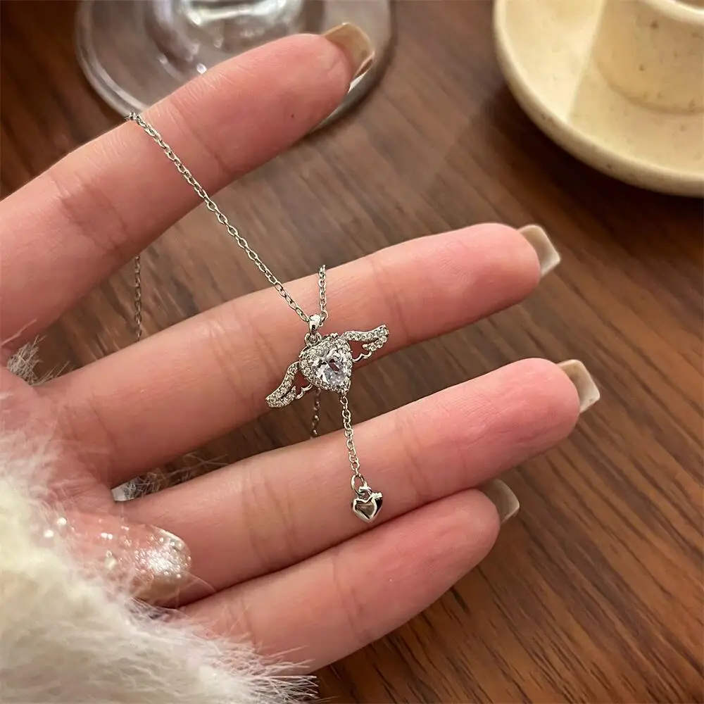 Collana con ciondolo a forma di cuore con ali d'angelo in cristallo, per donne e ragazze, semplice, y2k, rosa, bianco, zircone, elegante, gioielli da donna_voghion.com