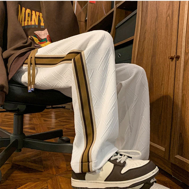

Новинка весна-лето 2024 модные Универсальные прямые однотонные полосатые брюки в американском стиле Свободные повседневные спортивные мужские брюки
