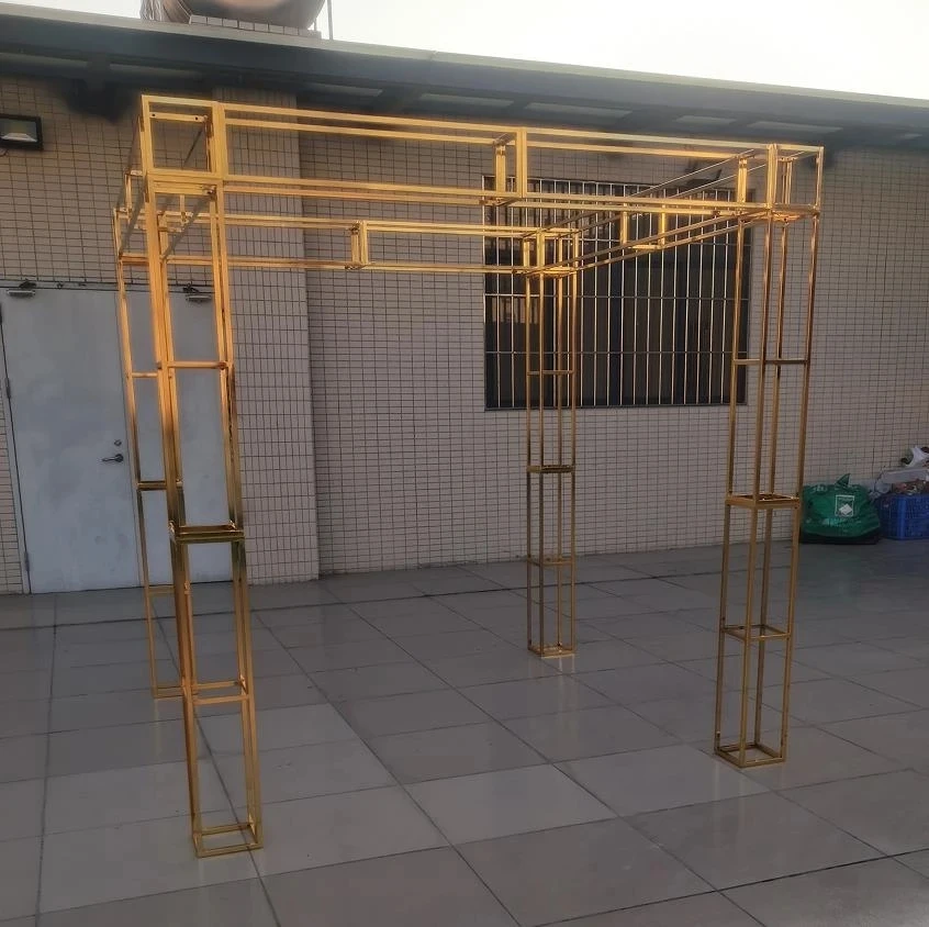 

gold mandap frame candle holders Gold Wedding Stage backdrop Metal Arch with candle holders For wedding decor