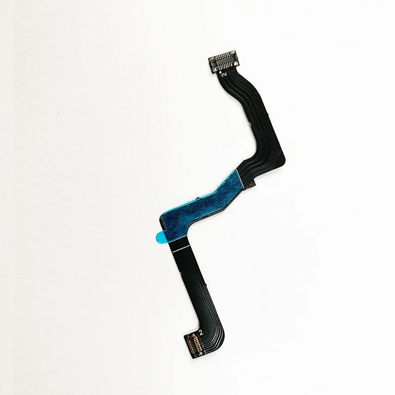 Câble plat pour cardan DJI Flip déroulé, ruban gris avec embouts orange, pièce essentielle pour réparation drone.