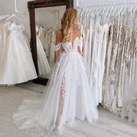 2025 Graceful A Line Women's Wedding Dresses Sexy Off The Shoulder Customized Bride Gowns Lace Appliques Backless Robe De Mariée 1