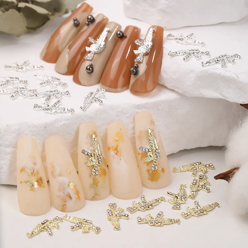 

10pcs 3D Charming Simulation Mini Gun Nail Art Jewelry With Diamond Alloy Metal Gold And Silver Nail Decoration Accessories