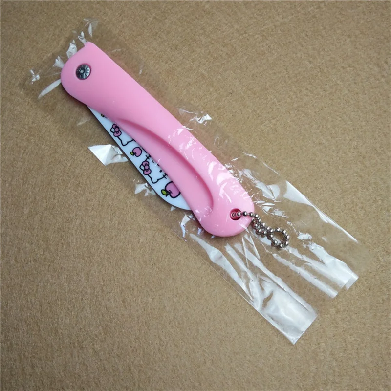Adorable Hello Kitty Ceramic Folding Fruit Toy Knife - Travel-Friendly Kawaii Sanrio Anime Cartoon Series Food Toy Knife and Peeler Set for Home and On-the-Go Fun - Image 4