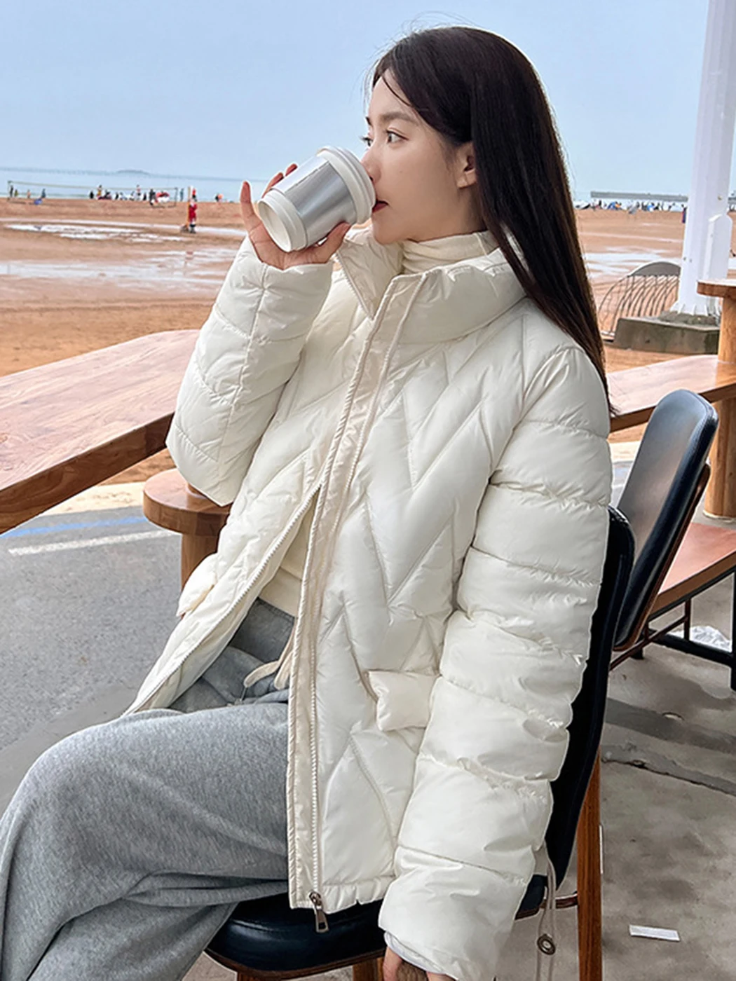 Женская зимняя куртка в клетку с длинным рукавом и воротником-стойкой |