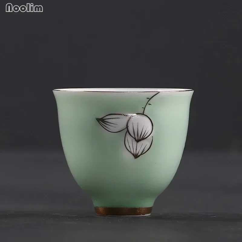 NOOLIM Ceramic Phnom Penh Handmade Teacup Hand Painted Lotus Master Cup White Porcelain Celadon Water Mug Kung Fu Drinkware