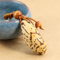 Personality Creative Natural Material Polished Thousand Eyes Bodhi Handlebar Key Chain Pendant DIY Car Pendant School Bag Buckle 1