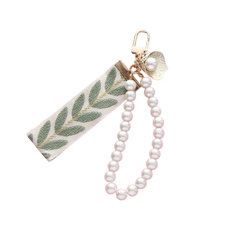 Mode Frische Band Perle Schlüsselbund für Frauen Kreative Gestreiften Tuch Band Gold Farbe Schlüssel Schnalle Tasche Kopfhörer Fall Dekoration – Detail 9