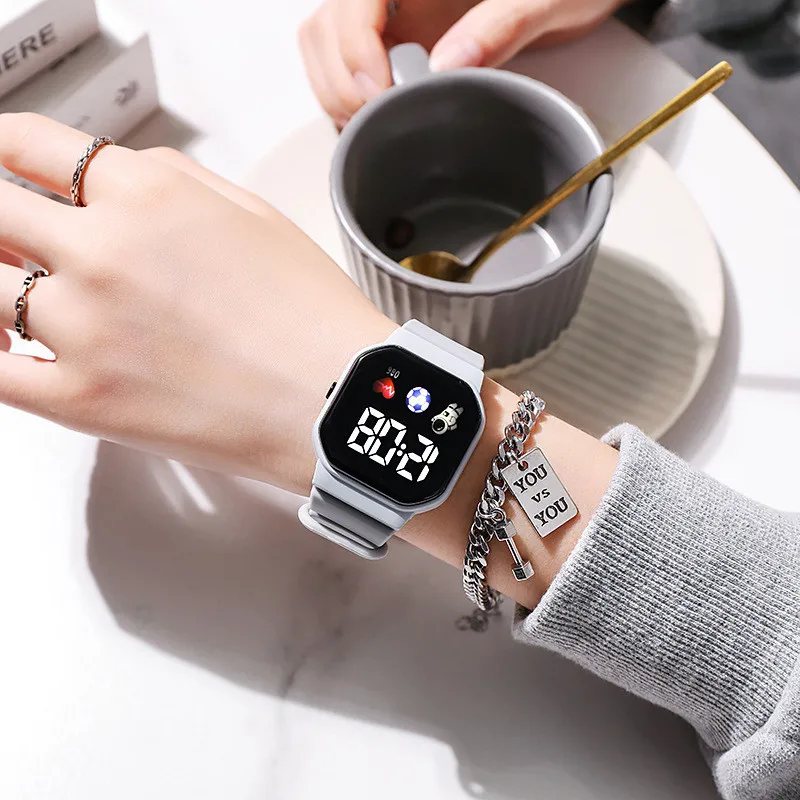 Children's watch, small square astronaut LED electronic watch, student party high-value simple and fashionable button watch