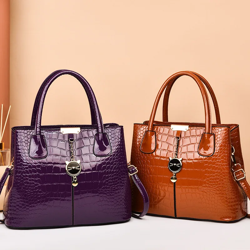 

Bright leather handbag 2023 autumn and winter new stone pattern women's bag large capacity single shoulder messenger bag