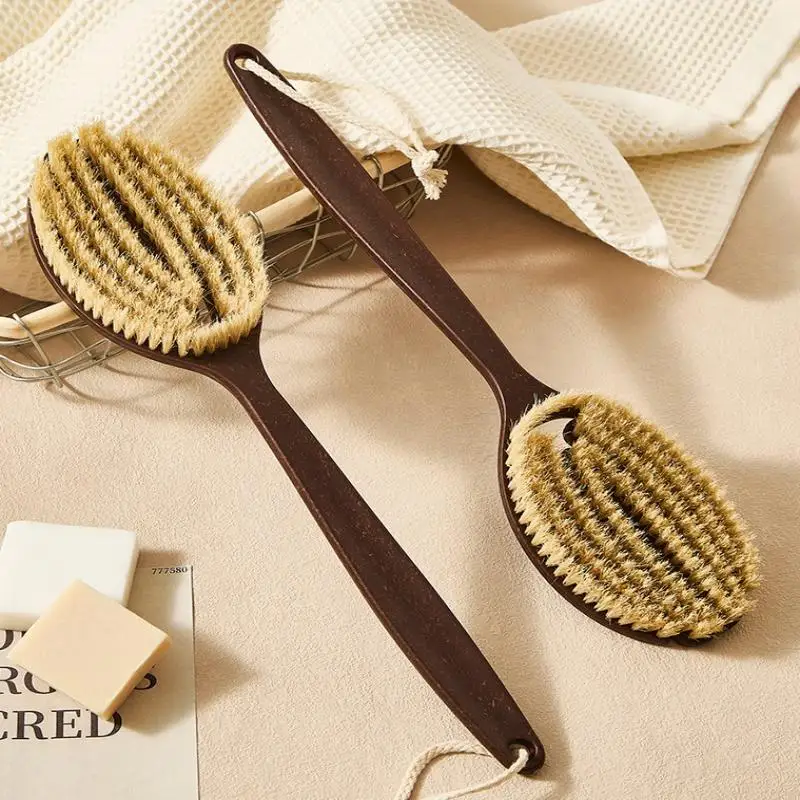 Soft natural bristle bath brush for gentle dry skin exfoliation and care.