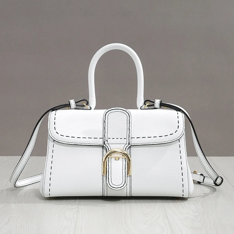 

Handmade horseshoe bag with external stitching, wedding bag