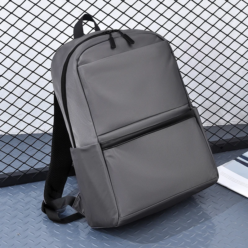 Men's large capacity laptop backpack with adjustable shoulder straps, durable for travel and school