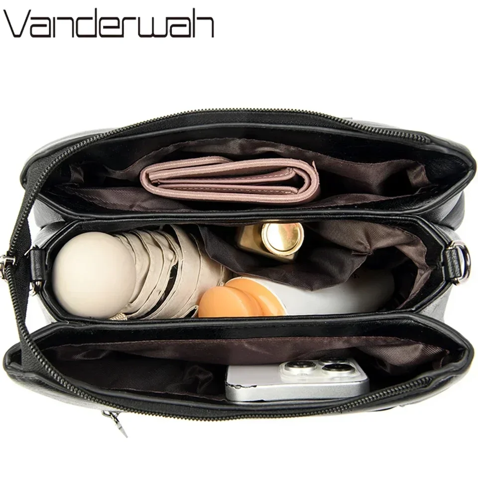 Women's Black Crossbody Bag with Embossed Kangaroo Logo