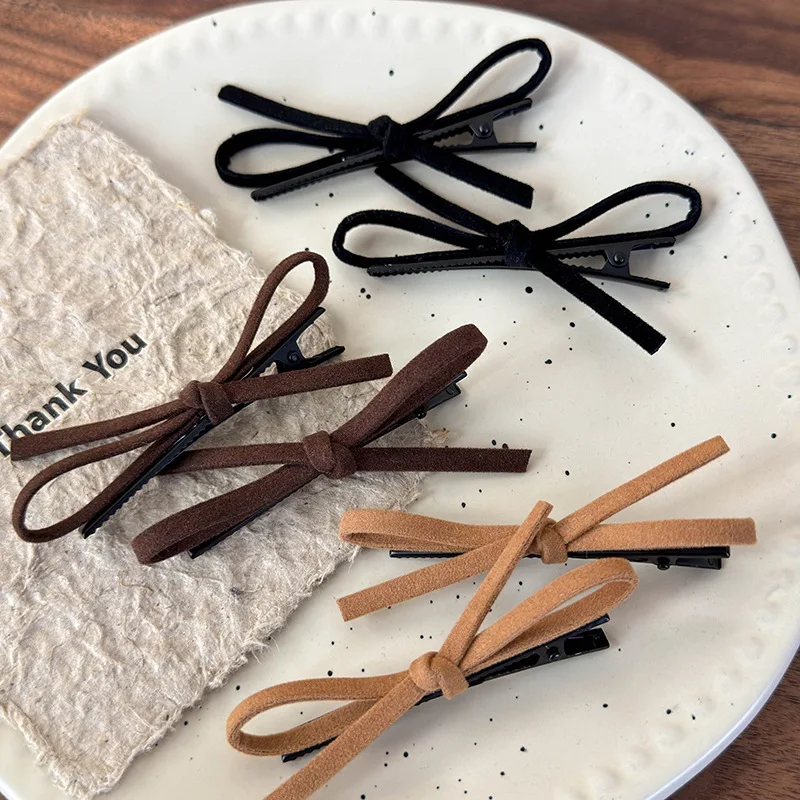 Side suede red bow bangs hairpin forehead headdress women's word clip edge clip autumn and winter 2024 new