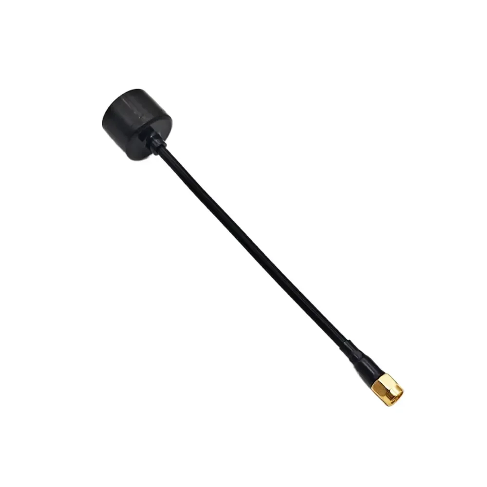 Antenne FPV 160mm 4.5dBi RHCP RP-SMA posée à plat, contraste entre le noir mat et le métal brillant du connecteur