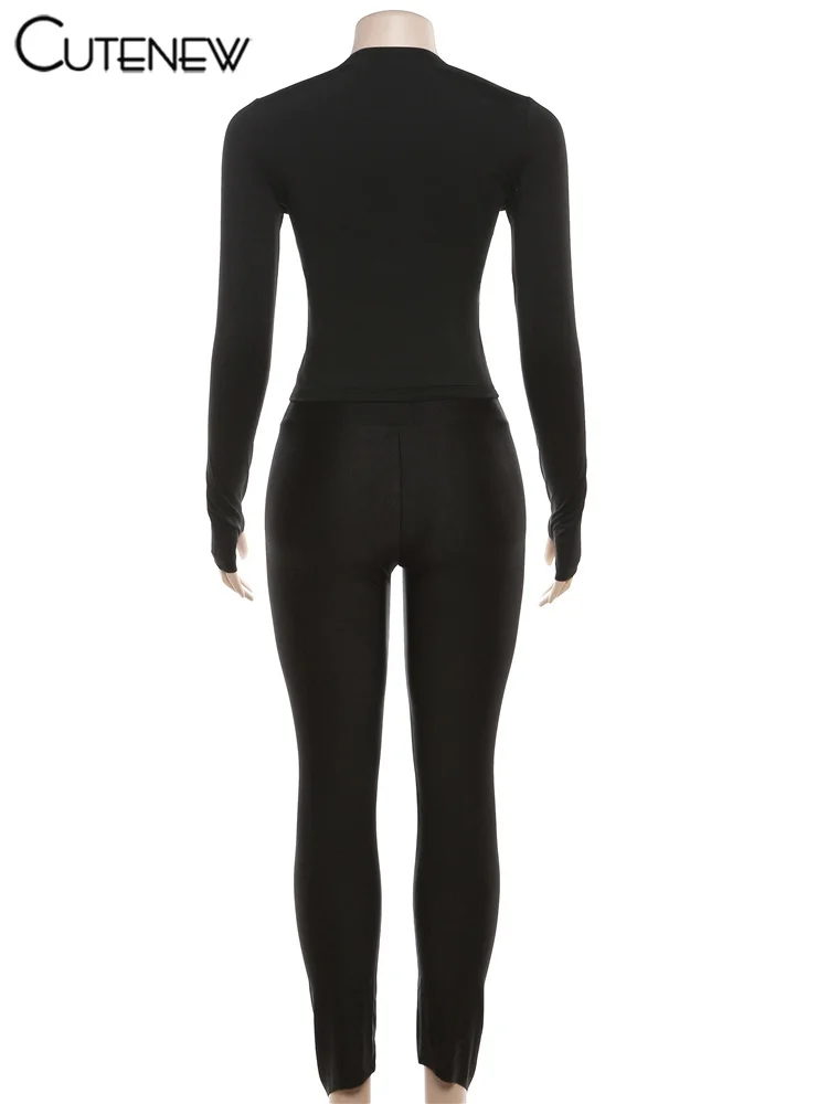 Conjunto de dos piezas elástico liso para mujer, top corto sexy ajustado de manga larga con cuello redondo y pantalones pitillo deportivos informales, chándal para mujer