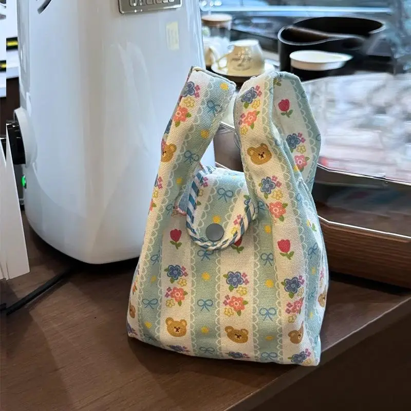 핫 세일 귀여운 곰 꽃무늬 휴대용 핸드백 대용량 사무용품 손목 가방 도시락 가방